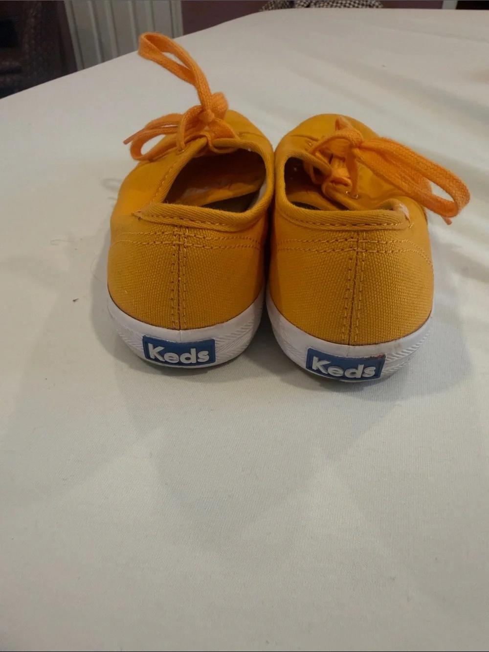 Keds women’s Canvas Lace-Up Sneakers in Yellow